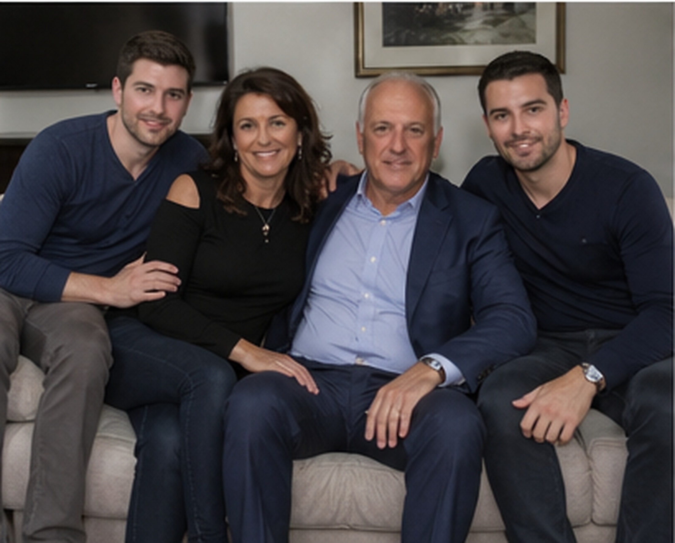Tony Iavarone family portrait in a luxury living room